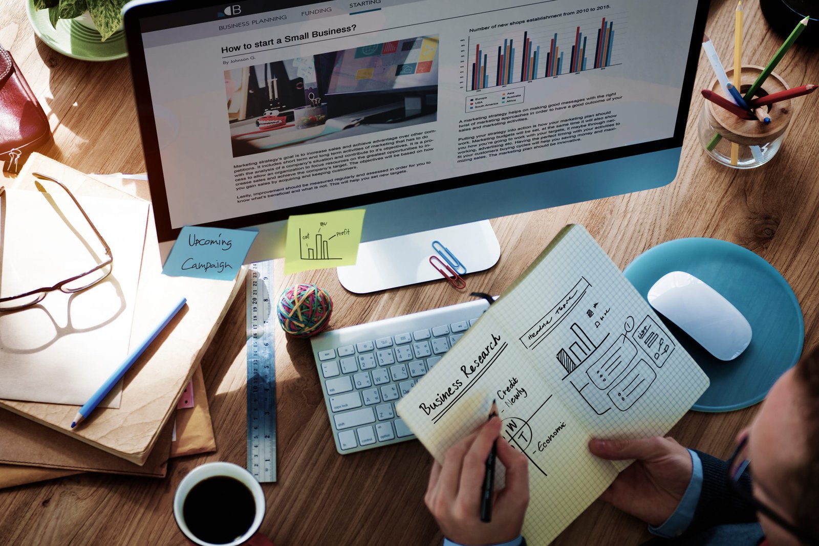 business-research-and-planning-on-wood-office-desk-2026-03-18-08-24-24-utc